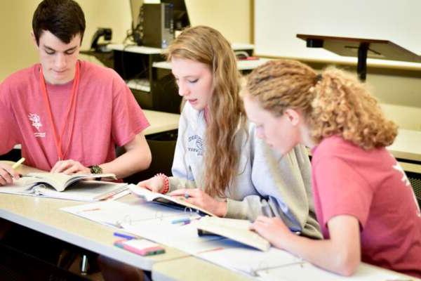 Students discuss a reading in class during BCYC Immersion